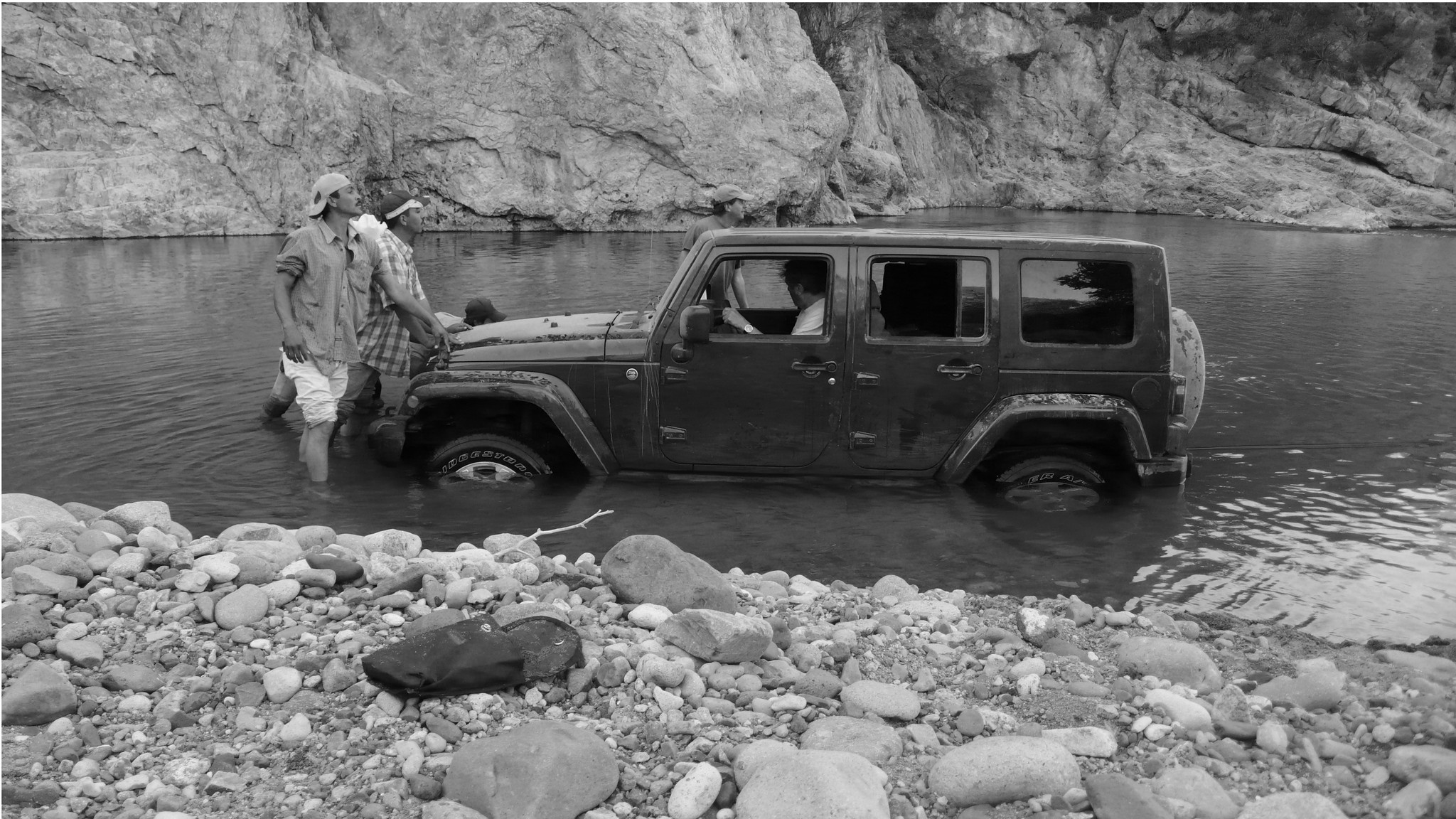 Martin's jeep, stuck in a riverbed.