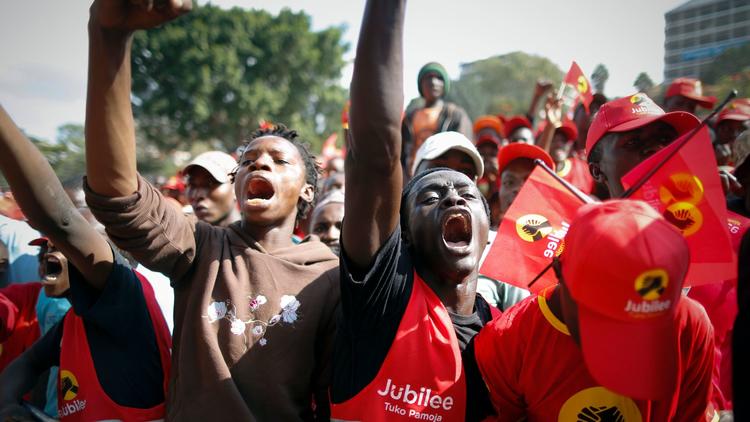 Supporters of incumbent Kenyan President Uhuru Kenyatta cheer at a recent campaign rally in Nairobi.
