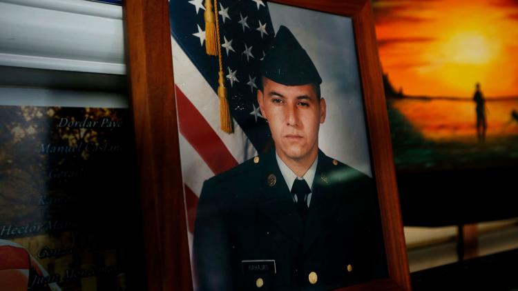 In his office, Hector Barajas keeps a photo of himself in his U.S. Army uniform at age 18.