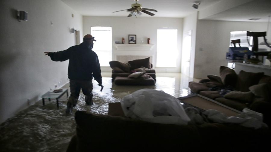 This home in the Houston suburb of Clodine was flooded by the rains from Hurricane Harvey. Only a fraction of Houston-area homeowners are insured against flood damage.  Photograph: Robert Gauthier/Los Angeles Times.