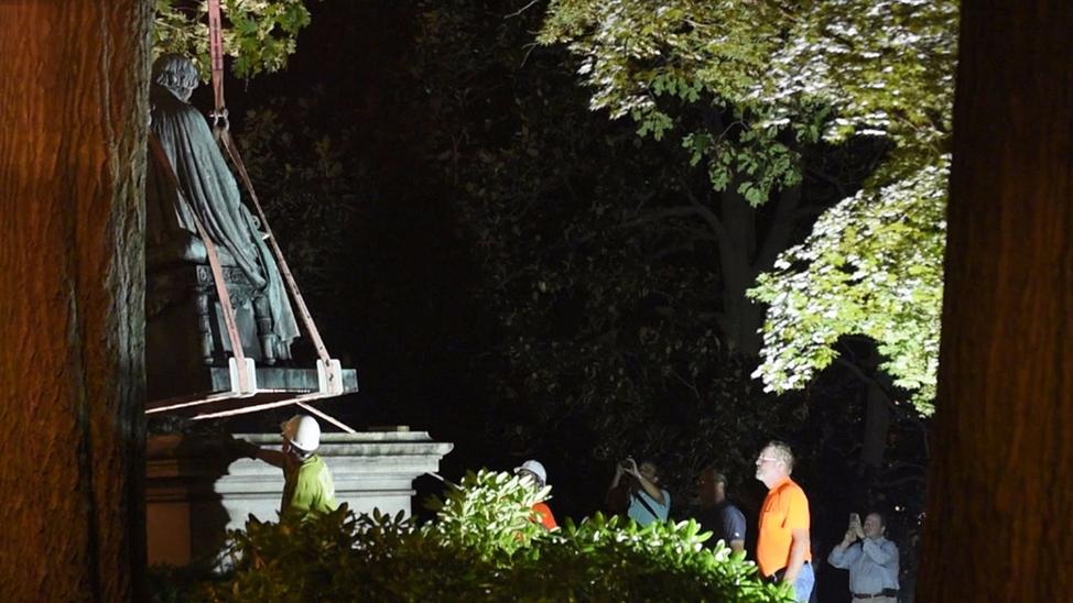 Crews slowly remove the statue of former Justice Roger Taney from the front lawn of the Maryland State House in Baltimore on August 17th. — Photograph: Matthew Cole/Tribune News Service.