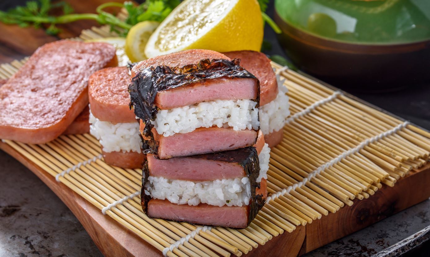 sushi made out of the fat/greasy food Spam in Hawaii, a cultural adaption