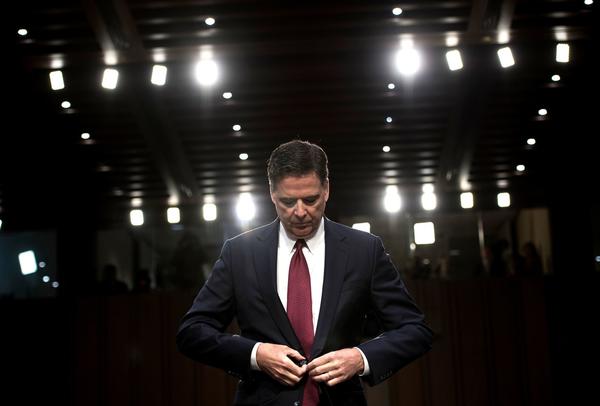 Former FBI Director James B. Comey attends a hearing before the Senate Select Committee on Intelligence hearing in Washington on June 8. (Brendan Smialowsk / AFP/Getty Images)