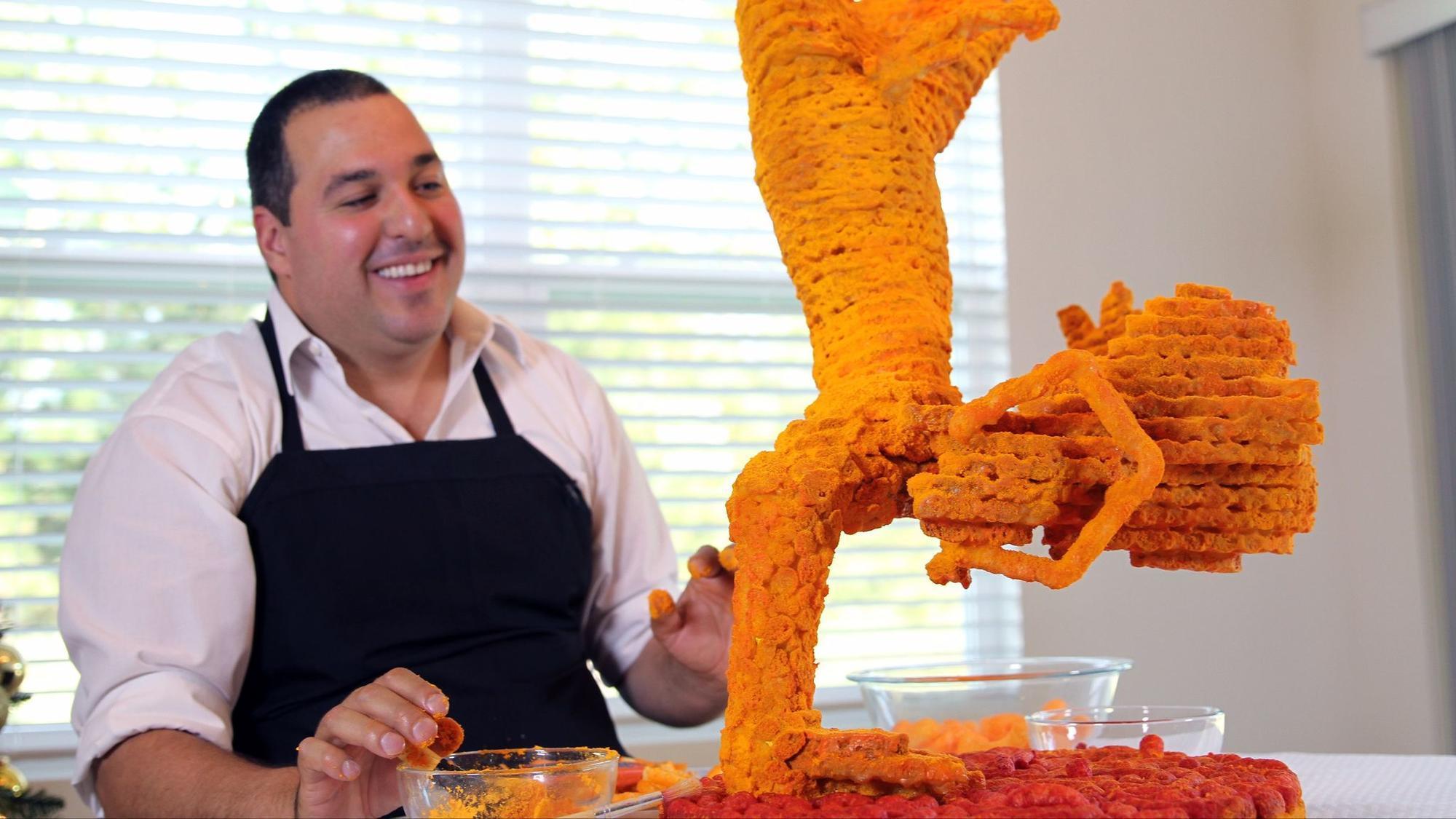 Artist uses thousands of Cheetos to make sculpture - Orlando Sentinel