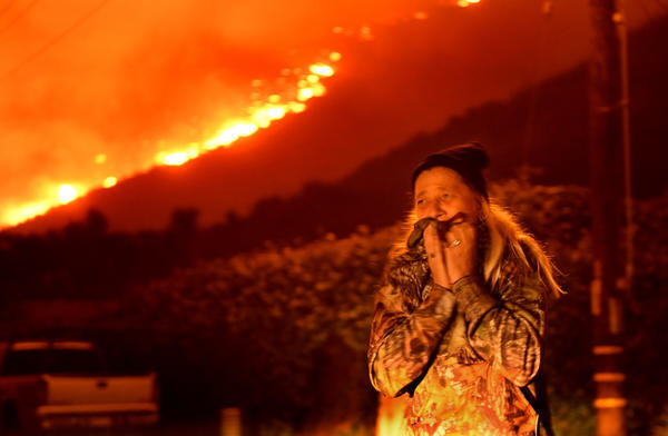 California fires rage into