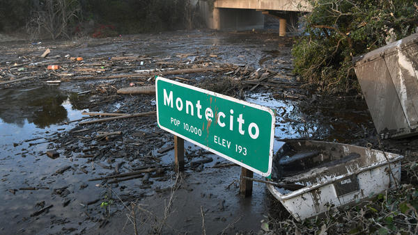 Thousands evacuated as first major rainstorm in a year hits Southern California