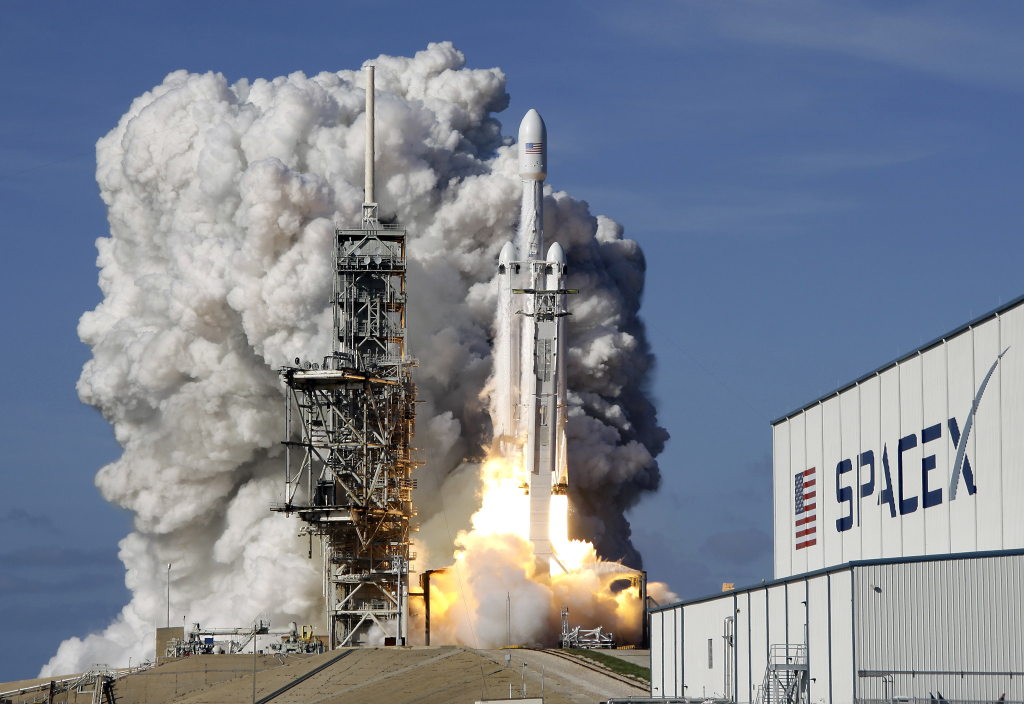  SpaceX s Big New Rocket Blasts Off Puts Sports Car In Space Chicago 