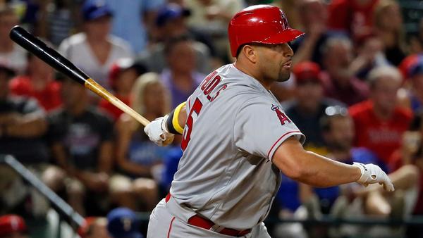 Albert Pujols looks like a new man on his first day at Angels camp