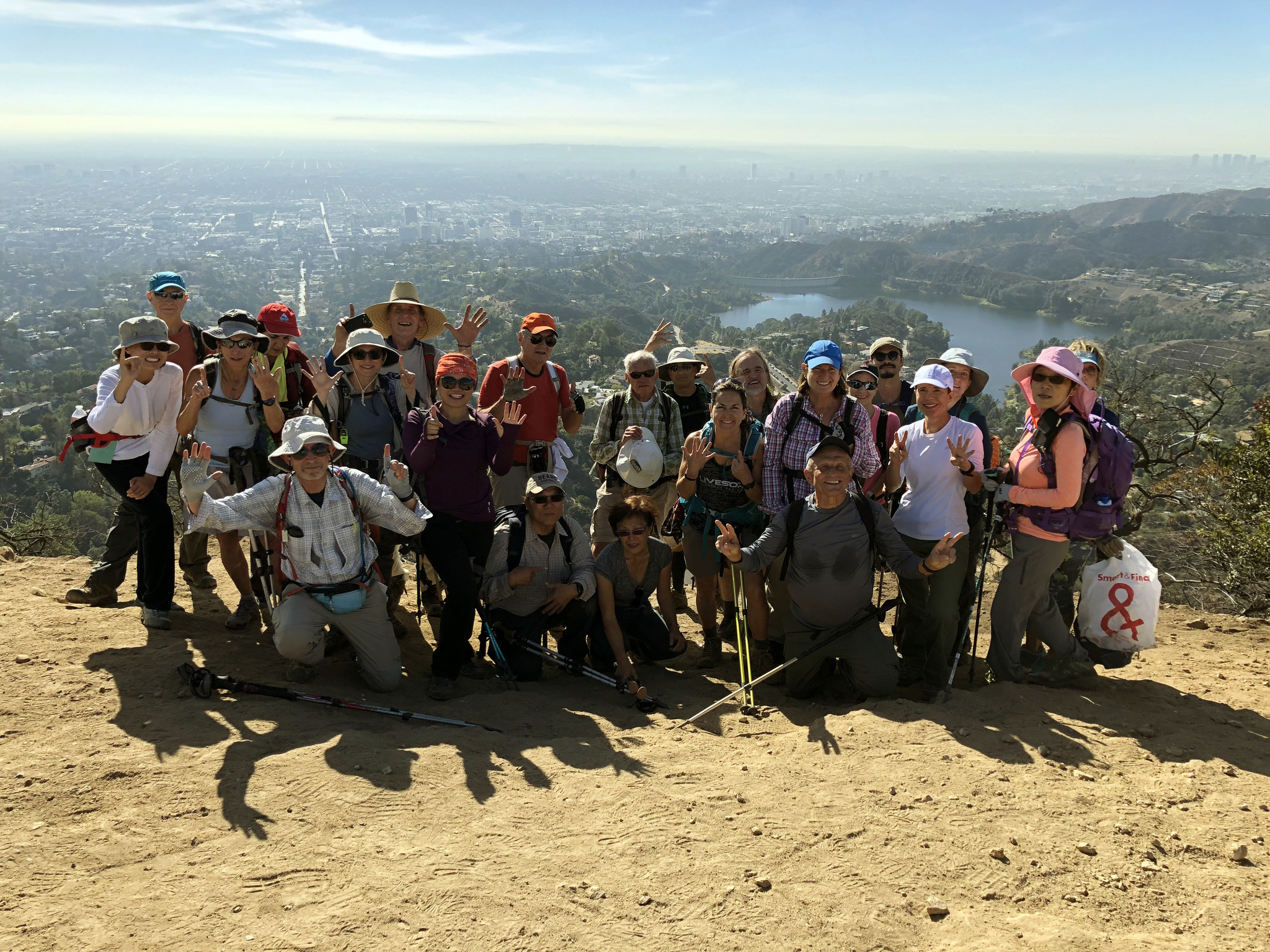 Sierra Club takes hikers to trails near and far. Here a group poses atop Mt. Lee in Griffith Park wh