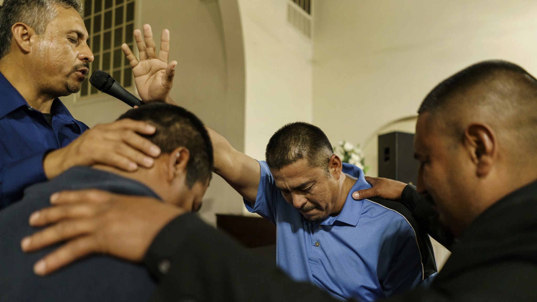 WASCO, CALIF. — WEDNESDAY, MARCH 7, 2018: Pastor Guillermo Aceves, far left, and other El Aposento