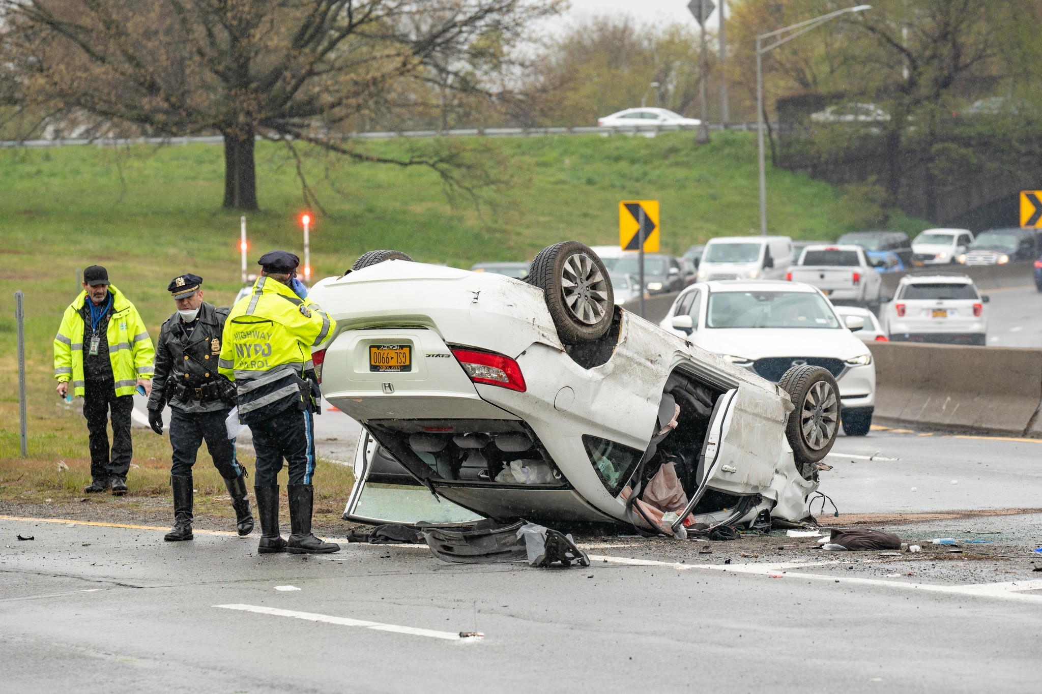 Woman clinging to life after single-car crash in Queens