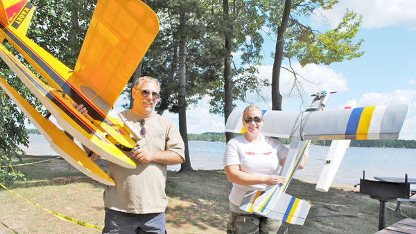 Pilots Rich Inman and Lindsay Stevenson, of Springfield, Ohio, wield their planes during last year's event.