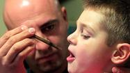 Photos: To treat son's epilepsy, a father turns to medical marijuana