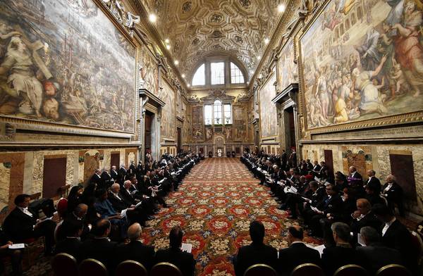Pope Francis addresses an audience of ambassadors at the Vatican. The new pontiff faces the challenge of bringing transparency to the Vatican's secretive bank, a task begun by his predecessor, Benedict XVI.