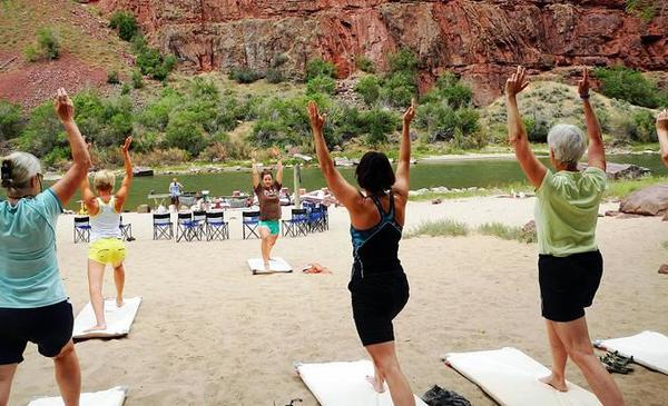 The Women's Therapeutic Yoga Adventure in June sets up camp along the Green River on beaches wide enough for yoga classes.