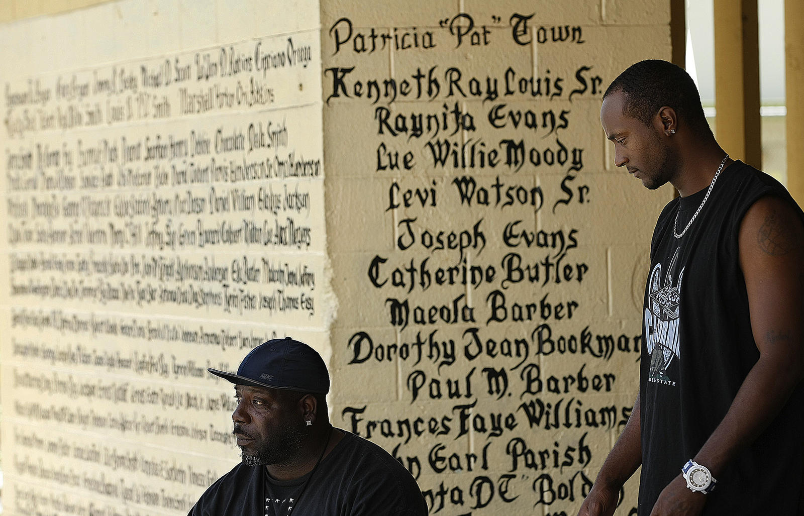 Eddie Williams, 44, left, and Louis Smith, 31, at 'the wall' in Nickerson Gardens.
