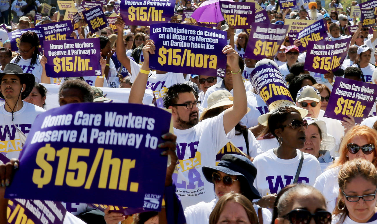 Workers demonstrate in favor a $15-an-hour minimum wage in Los Angeles in April.