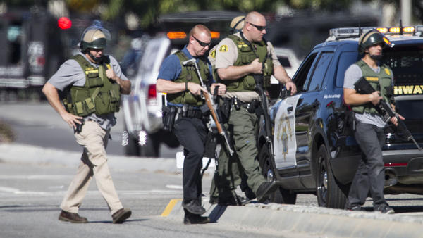 Police secure the scene of the mass shooting.  (Gina Ferazzi / Los Angeles Times)