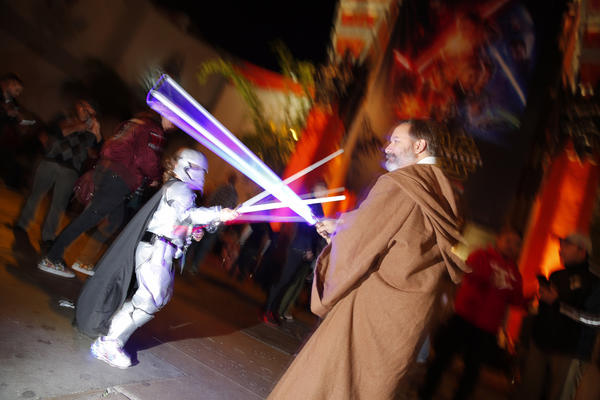 Put away your magic wands. It's the season of lightsaber. (Jay L. Clendenin / Los Angeles Times)
