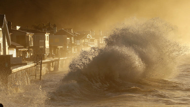 Heavy surf slams the homes at Mondos Beach between the Solimar and Faria Beach communities in Ventura County early Thursday morning. (Al Seib / Los Angeles Times)