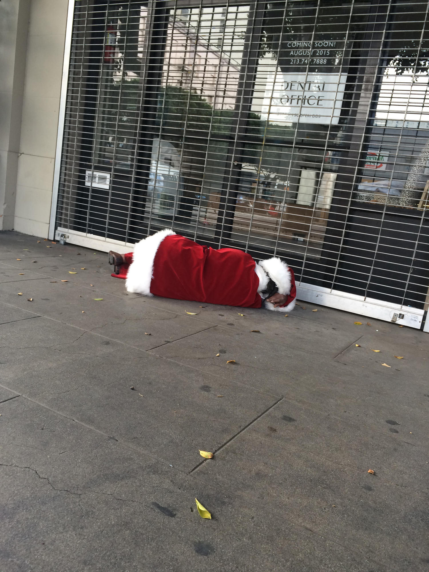 A man dressed as Santa Claus passed out in the middle of the day at 7th and Main.