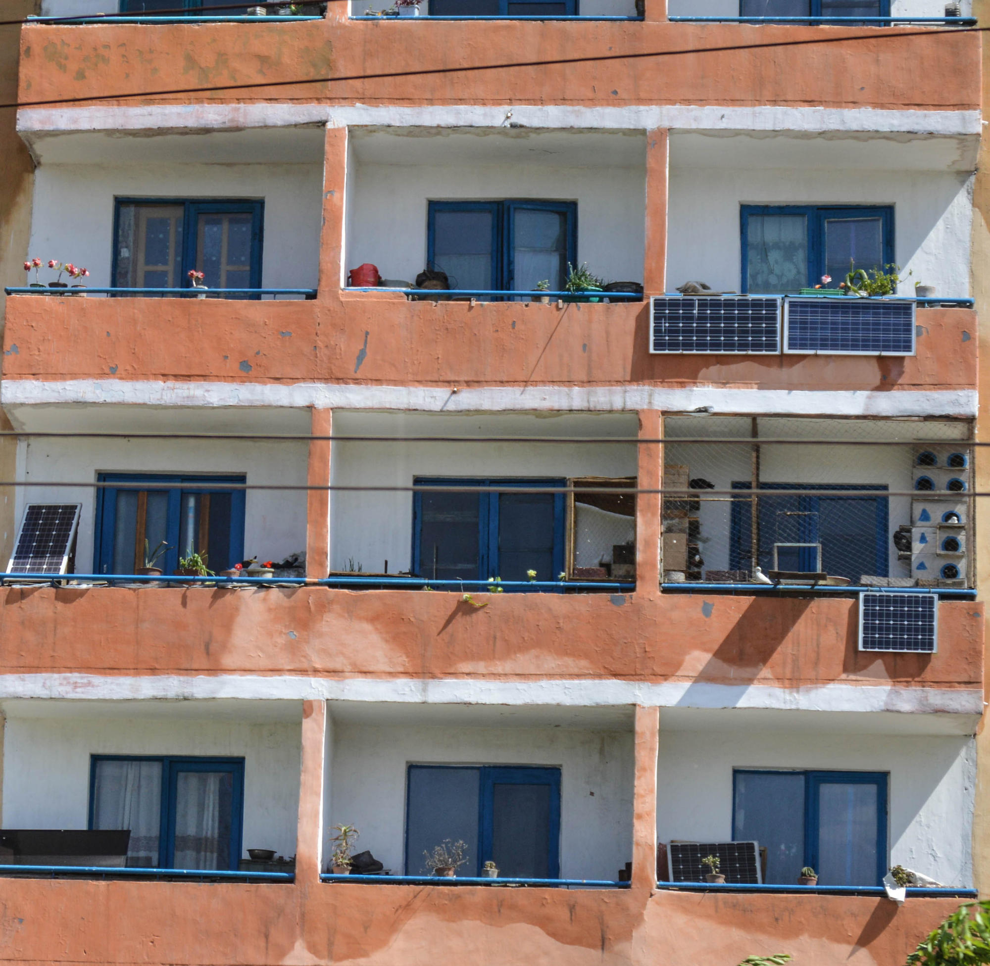 Solar panels seen on individual balconies at an apartment building in Pyongyang, North Korea.
