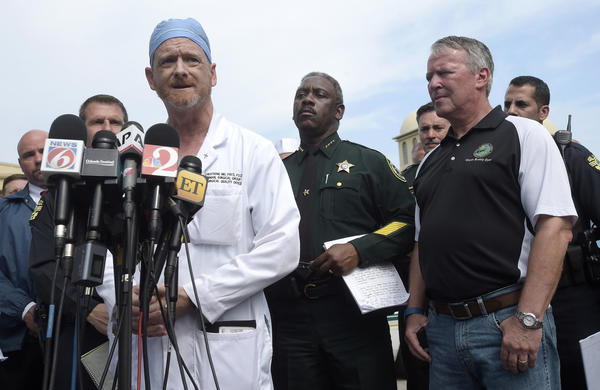 Dr. Michael Cheatham of Orlando Regional Medical Center addresses reporters. (Phelan M. Ebenhack / Associated Press)