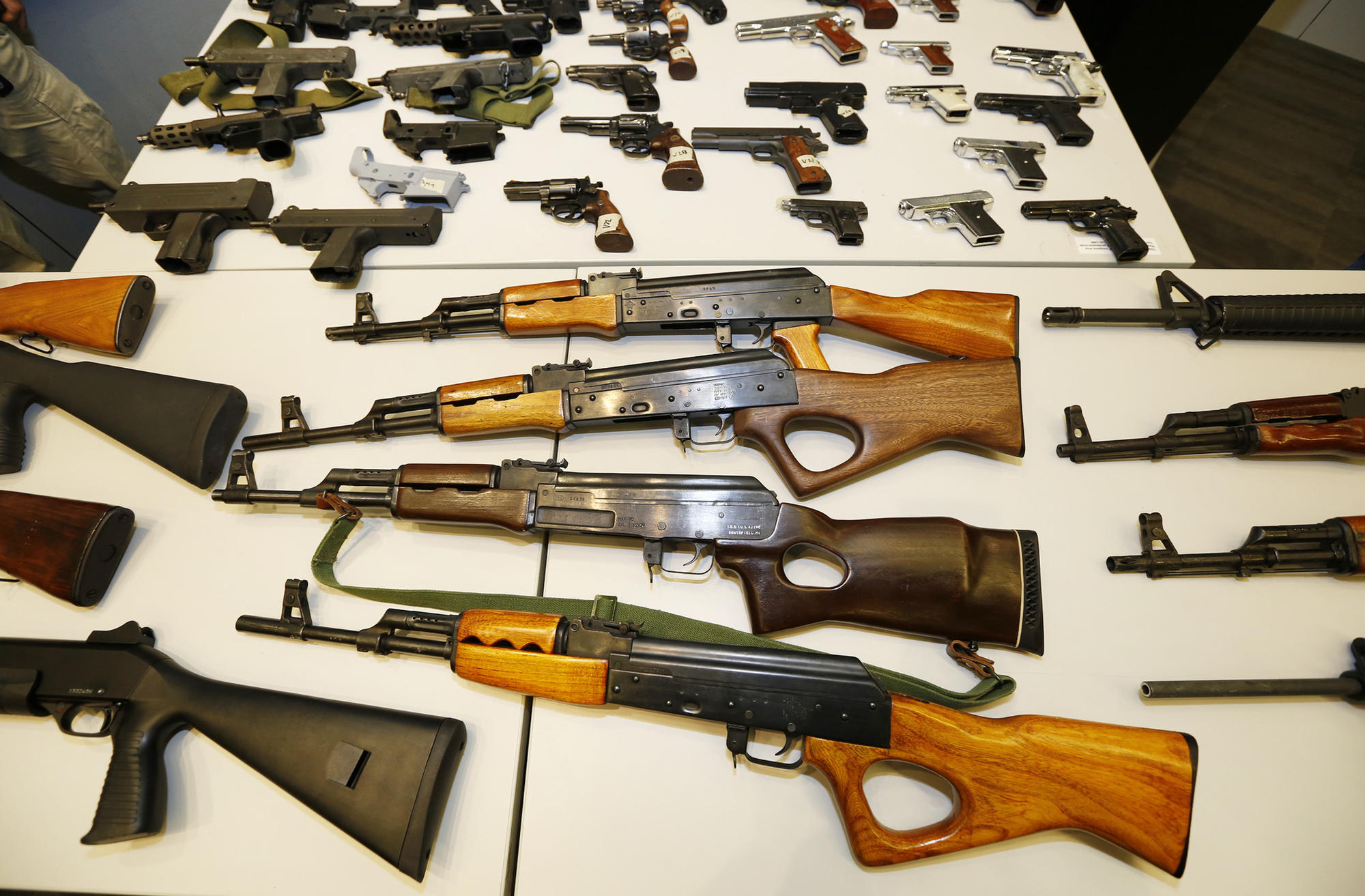 The Los Angeles Police Department displays weapons collected during a daylong gun buyback program in May.
