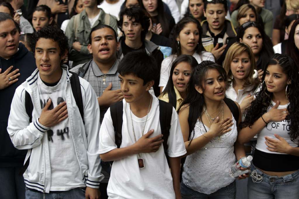 North High School students pledged Allegiance in English and Spanish during a protest for immigrant rights at Riverside City Hall on March 31, 2006.