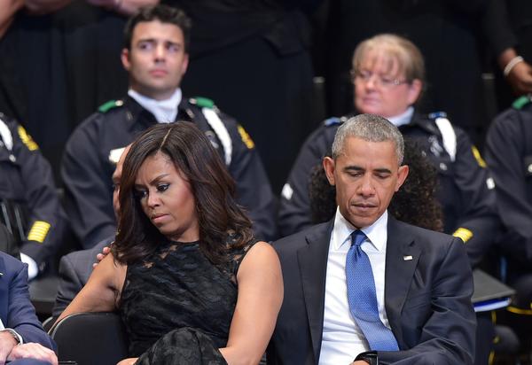 U.S. President Barack Obama and First Lady Michelle Obama attend an interfaith memorial service for the victims of the Dallas police shooting at the Morton H. Meyerson Symphony Center on July 12, 2016 in Dallas, Texas. (MANDEL NGAN/AFP/Getty Images)