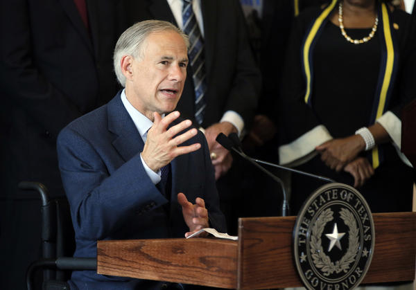 Texas Gov. Greg Abbott discusses police shootings in Dallas during a news conference on July 8. (Tony Gutierrez / Associated Press)