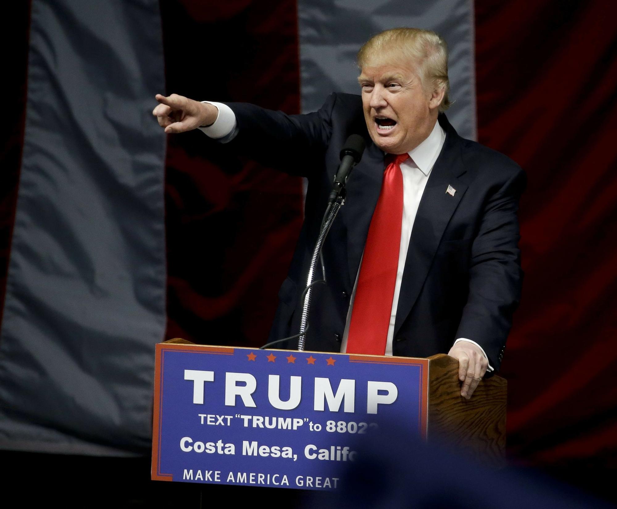FILE - In this April 28, 2016 file photo, Republican presidential candidate Donald Trump speaks during a rally in Costa Mesa, Calif. Police are preparing for the possibility of p