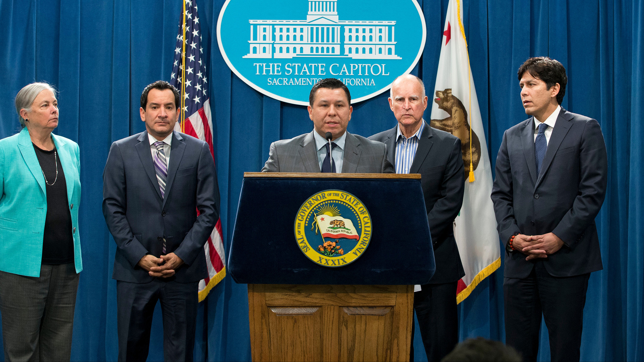 Garcia speaks at a news conference with other leaders after the climate legislation was passed.