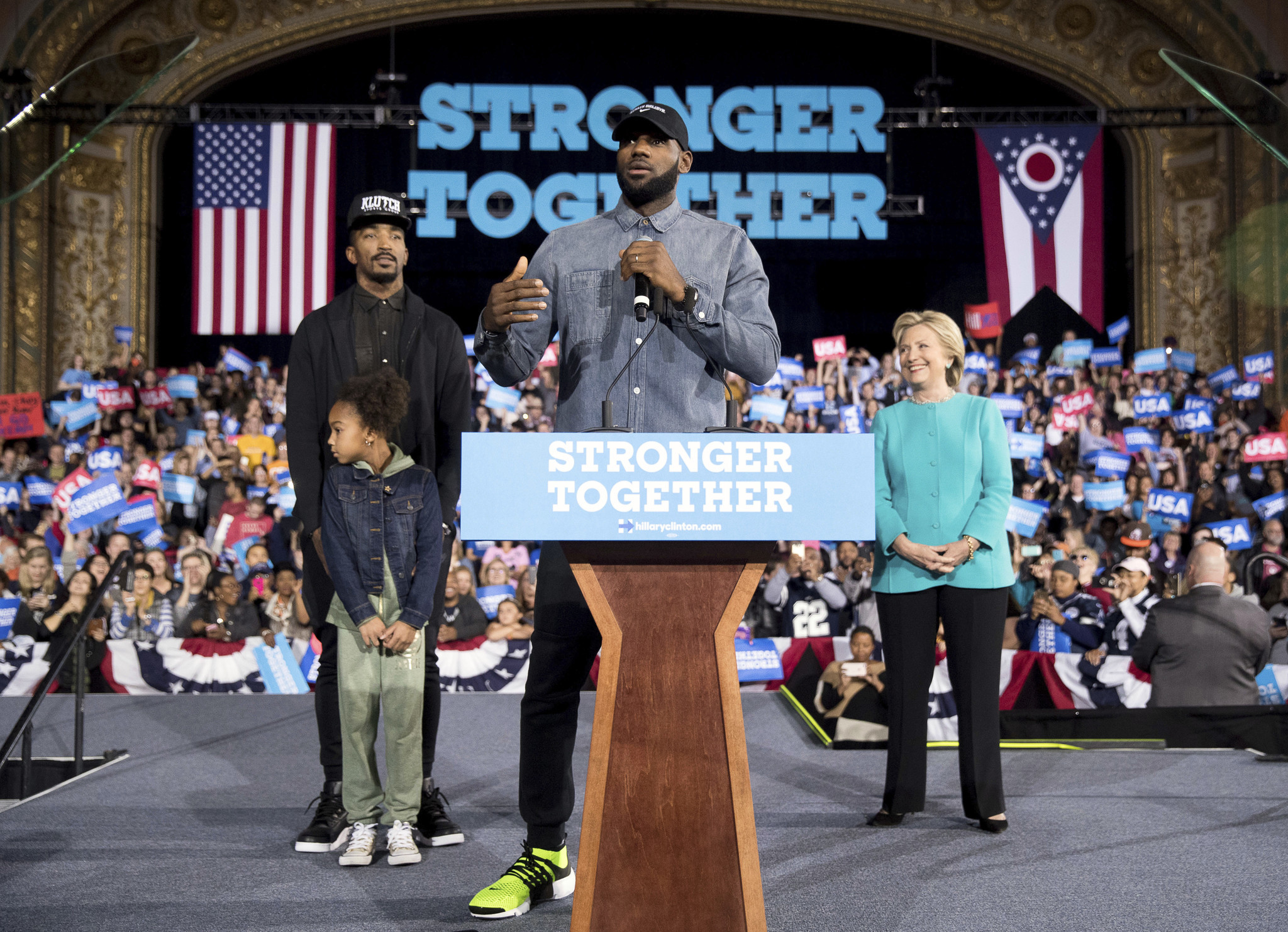 LeBron James, center, accompanied by Cleveland Cavaliers teammate J.R. Smith, left, and his daughter Demi, joined Hillary Clinton at a rally at the Cleveland Public Auditorium on Nov. 6.