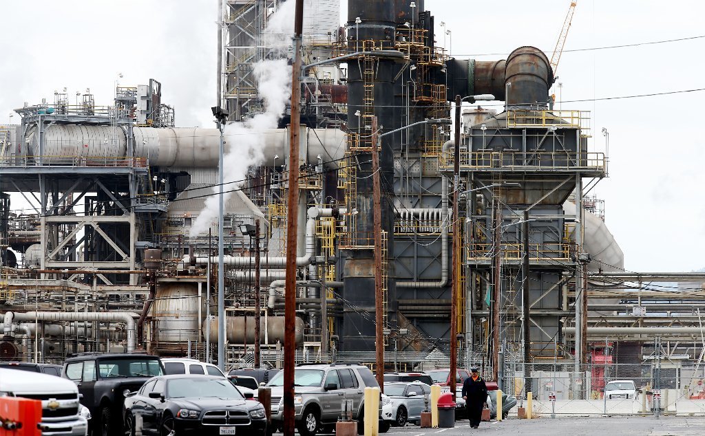 Oil refineries, such as this one in Torrance, could face stricter rules on emissions.
