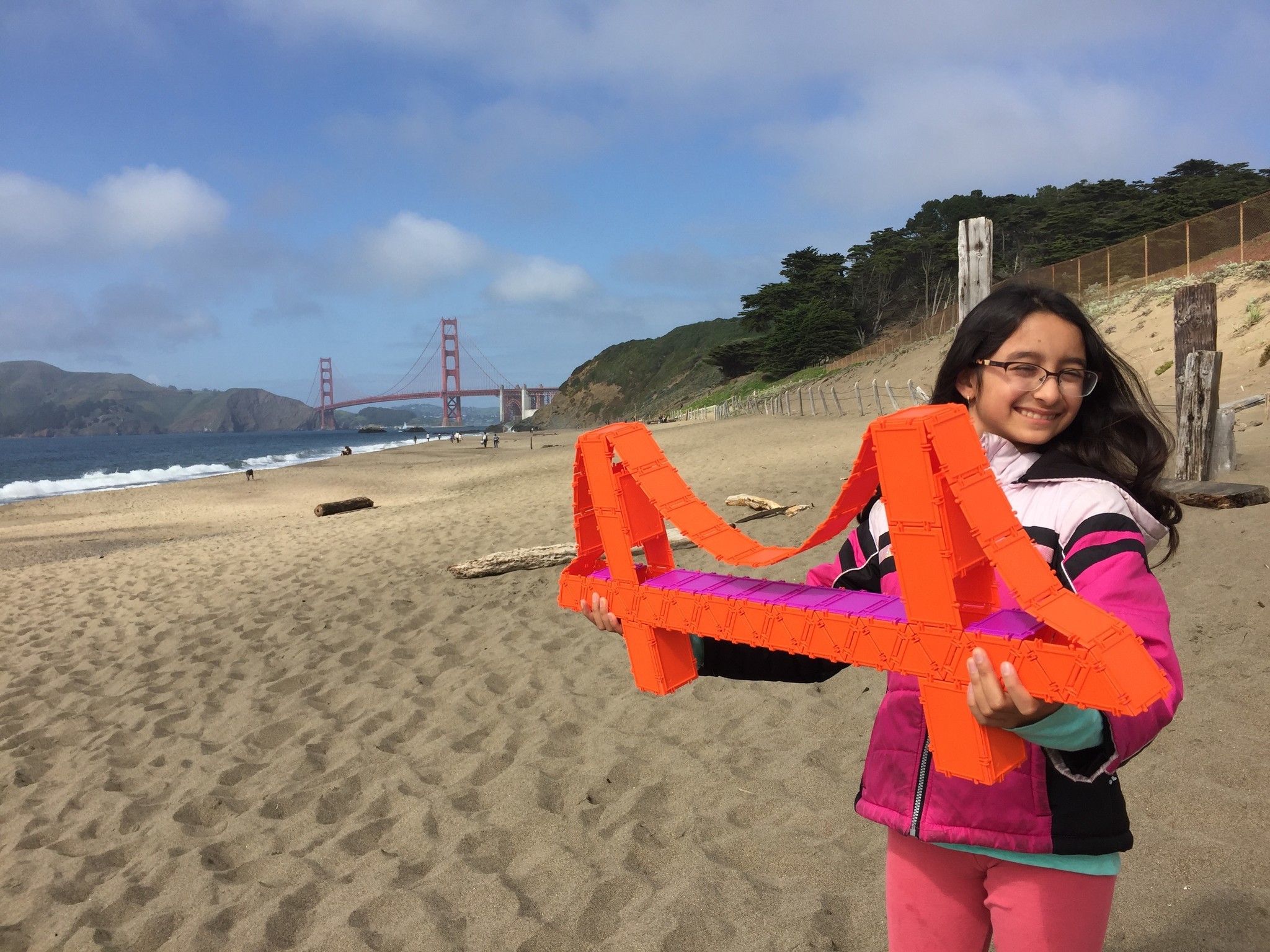 Yana Mohanty’s daughter Nina shows off a Golden Gate Bridge made of Geometiles.