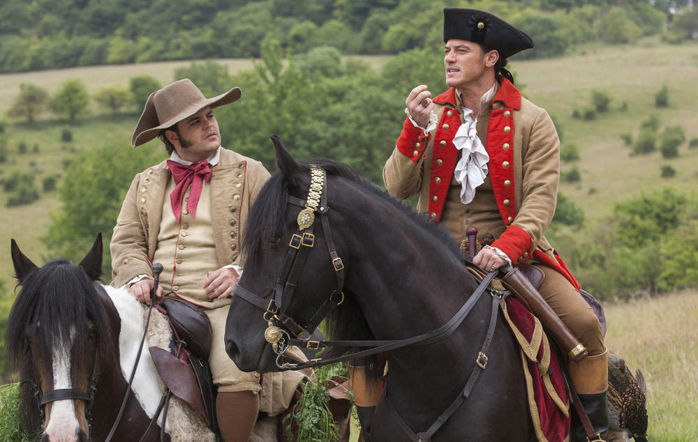 Josh Gad as LeFou, left, and Luke Evans as Gaston in "Beauty and the Beast." (Laurie Sparham / Disney)