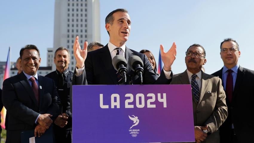 Los Angeles Mayor Eric Garcetti, center, speaks during a news conference. The city had made a bid on the 2024 Games.