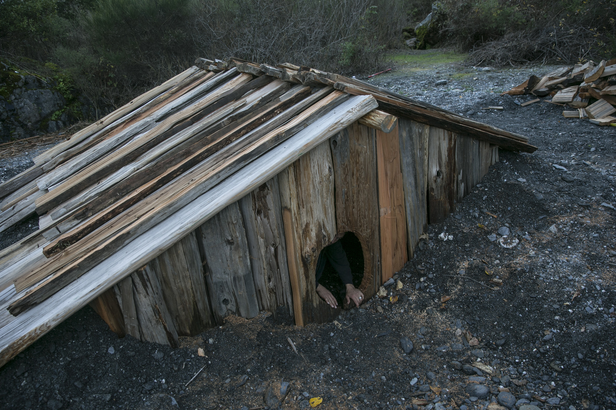 The Yurok people traditionally lived in redwood plank villages along the river. The sweat house, lik