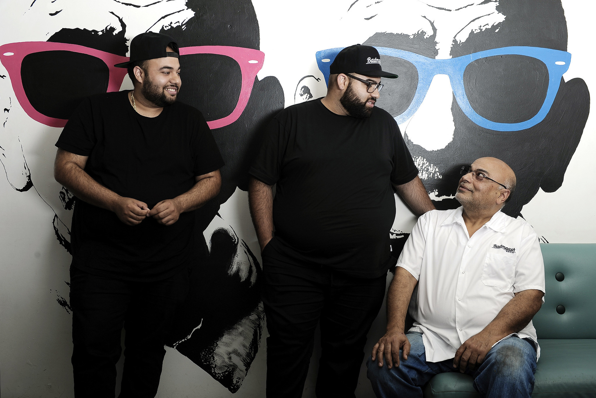 Pawan Mahendro, right, and sons Nakul and Arjun are chefs and owners of Badmaash.