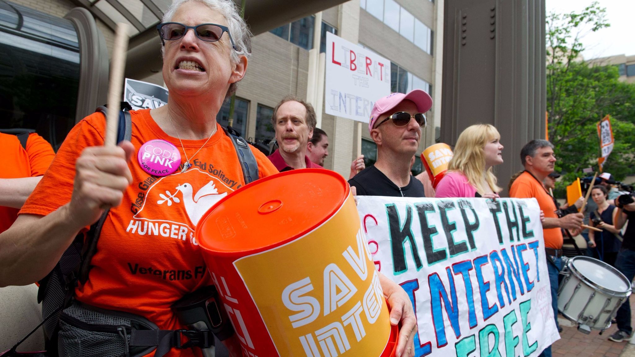 Protesters hold a rally to support net neutrality outside the Federal Communications Commission's headquarters in Washington, D.C., on May 15, 2014.
