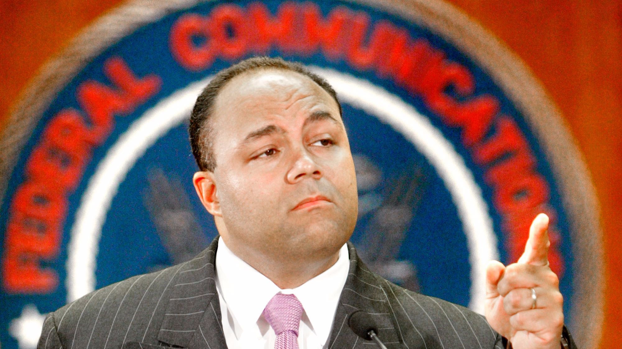Federal Communications Commission Chairman Michael Powell gestures during a 2003 news conference