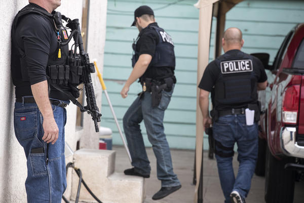 An Immigration and Customs Enforcement fugitive operations team surrounds a Montebello home where a 47-year-old Mexican national lives with his family.