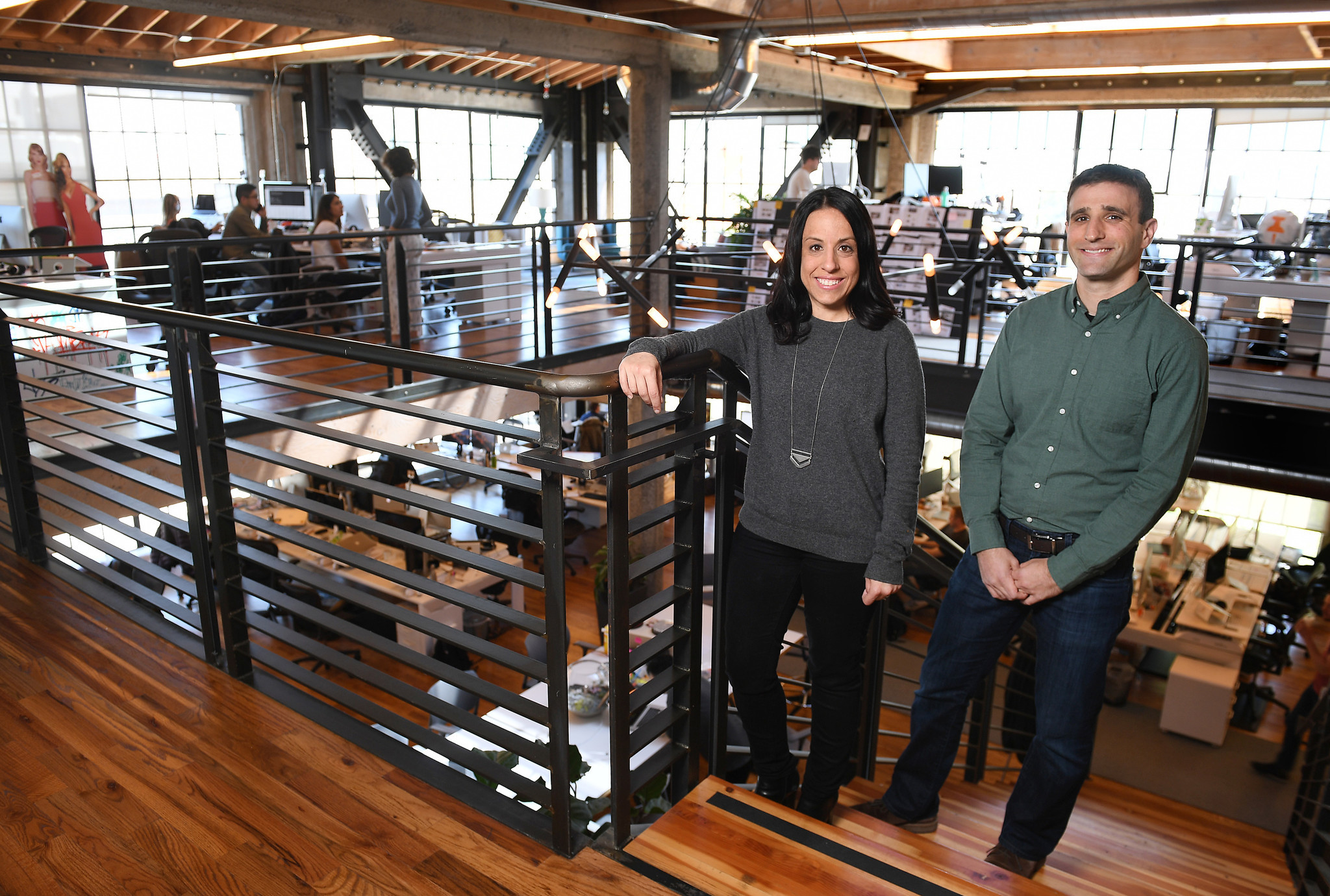 Katie Biber, center, former general counsel for Mitt Romney, and Steven Siger, right, who worked for President Obama, are now attorneys at Thumbtack in San Francisco.