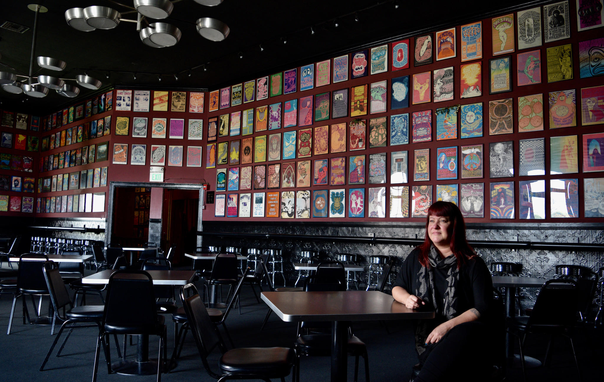 Amie Bailey-Knobler, general manager of the Fillmore in San Francisco, is shown in its Poster Room, where hundreds of concerts from over the decades are represented on the walls.