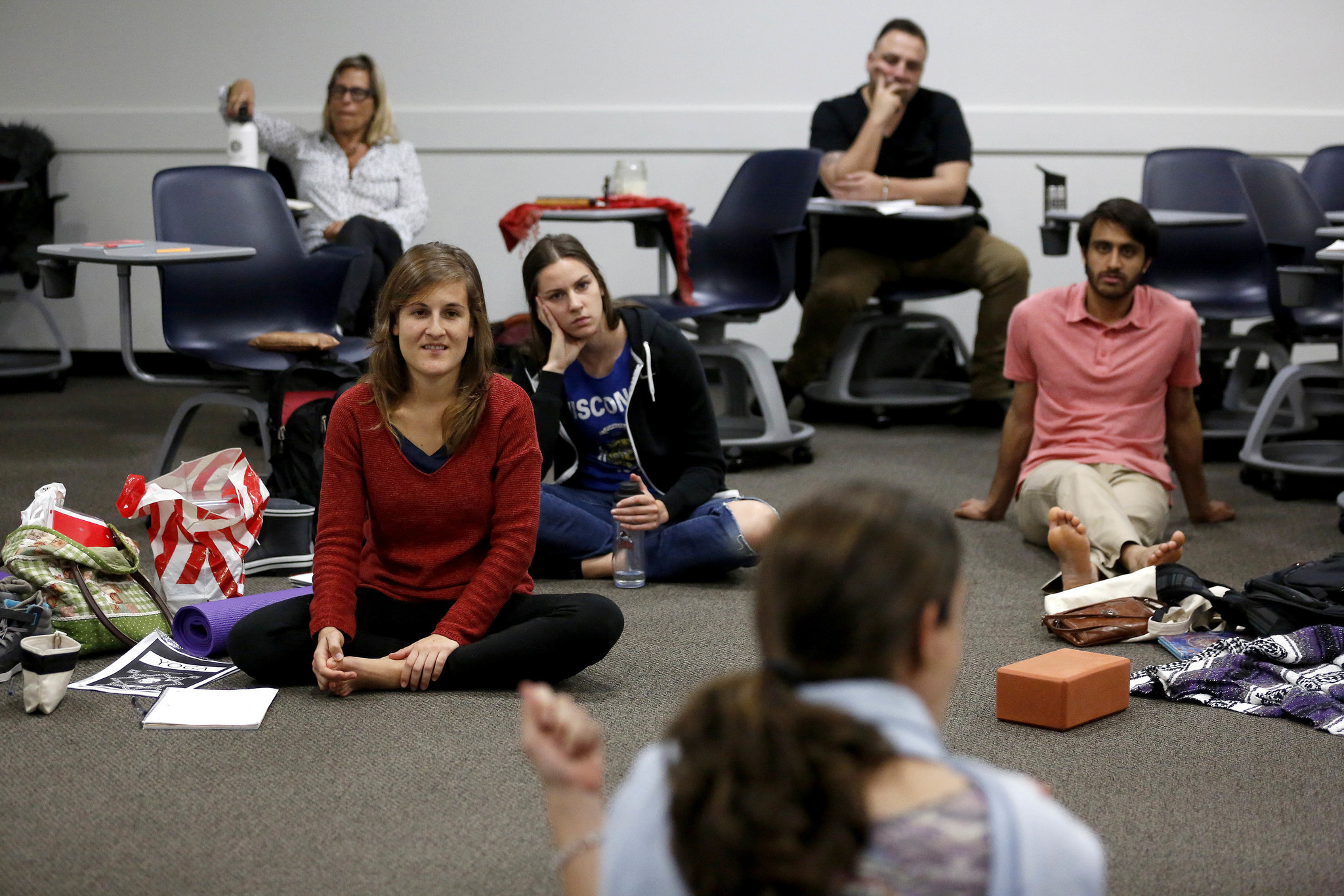 First-year master's degree in yoga students attend a class taught by professor Ana Funes at Loyola Marymount University, in Los Angeles. LMU is the only place in the U.S. you can get a master’s degree in yoga studies.