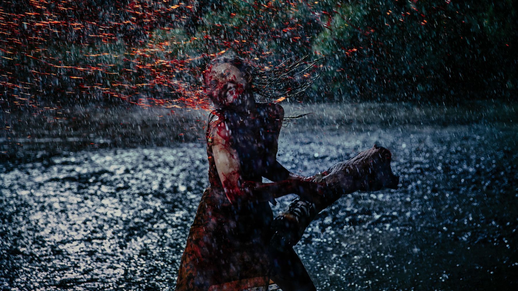 Emily Browning uses her character's severed arm as a weapon in 