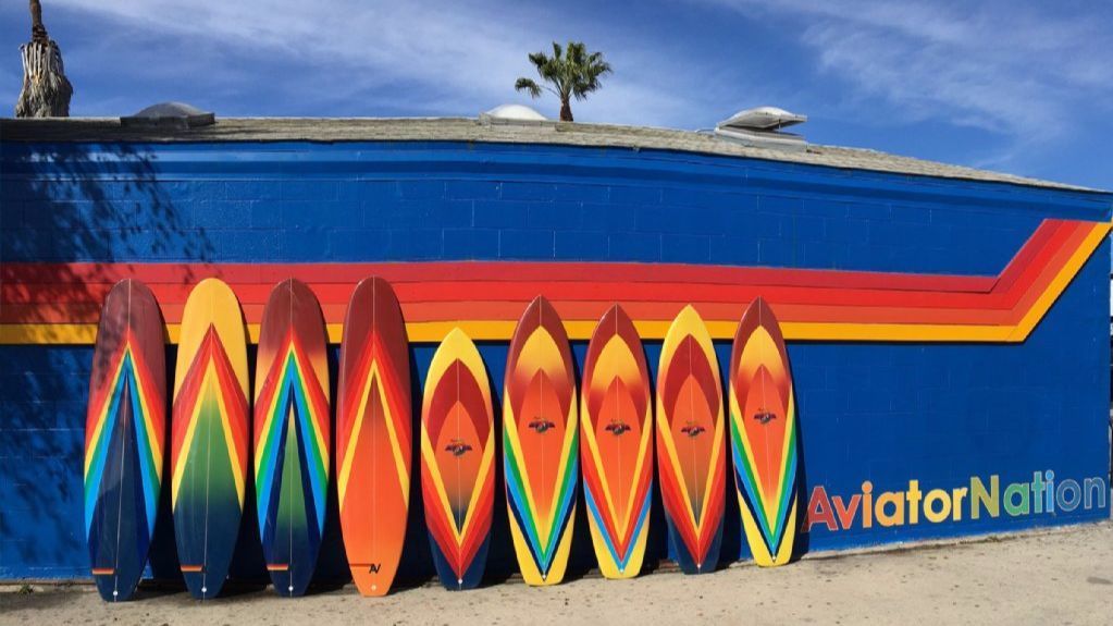 Aviator Nation limited-edition, signed and numbered surfboards designed by Paige Mycoskie, hand-shaped by Bruce Fowler and airbrushed by Bob Haakenson sell for $1,500 each.