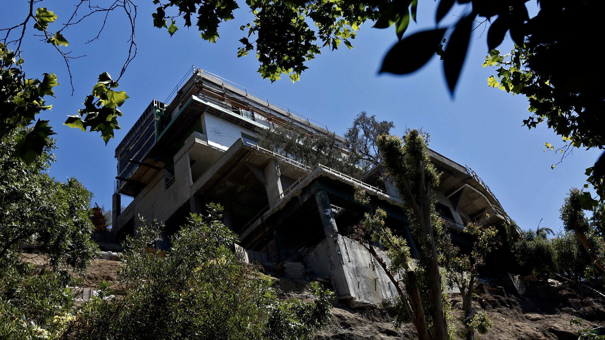 Three years ago, Los Angeles demanded that builders halt work on this mansion in the hills of Bel-Air.