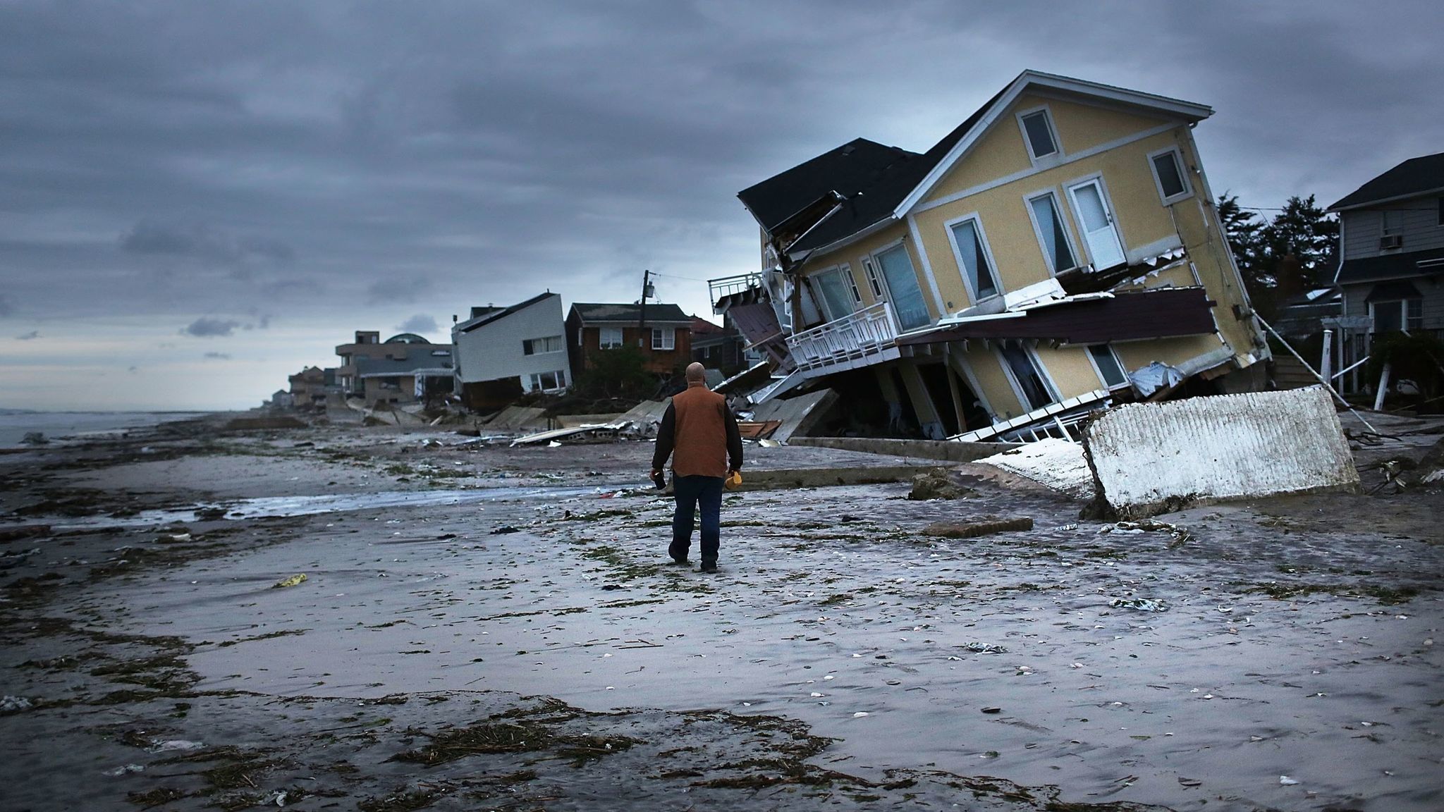 Damage is viewed in the Rockaway neighborhood of the Queens borough of New York City, where the historic boardwalk was washed away during Hurricane Sandy.